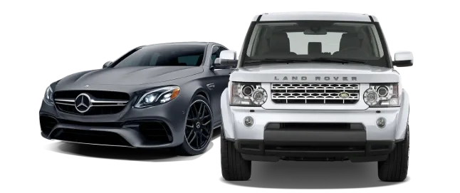 Grey-black Mercedes-Benz and silver Land Rover